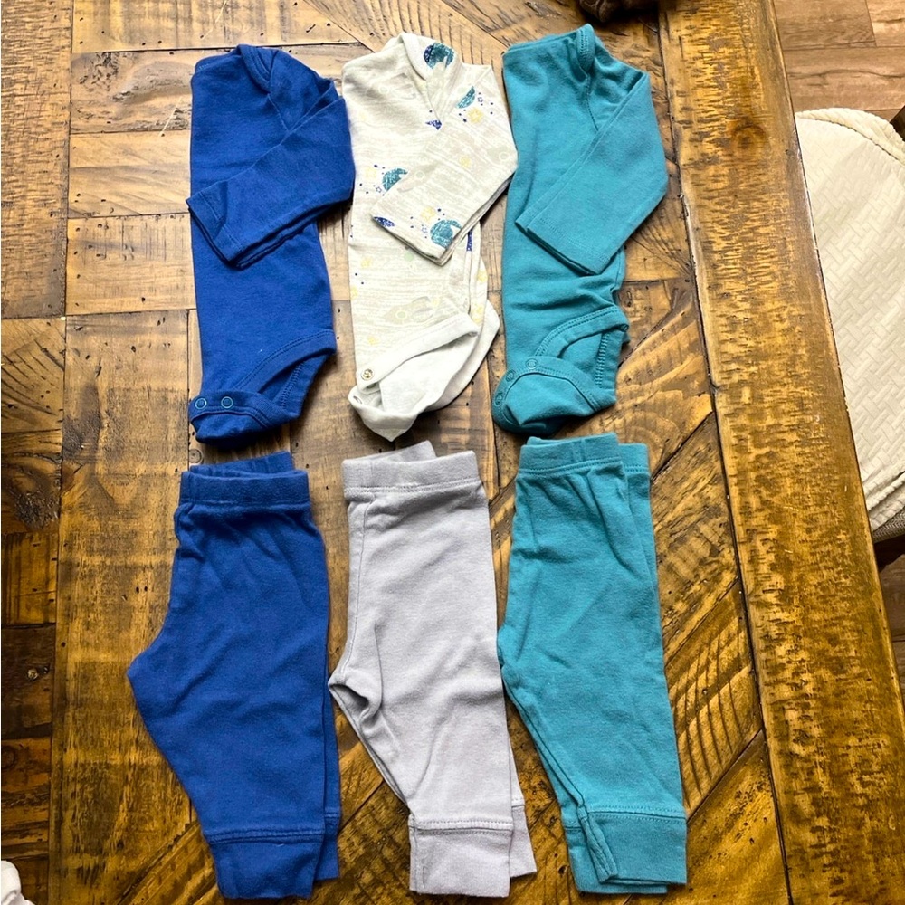 3 Newborn outfits by Cloud Island. Like new.
